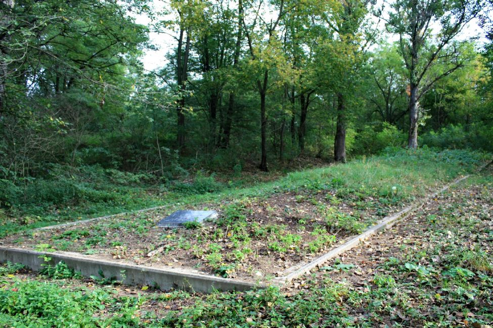 Mass grave at the former Germanovo murder site. Photographer: Eugene Shnaider, 2012.